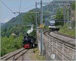 Durch die Grösse des Bahnhofs Chamby und des Betriebsgeschehen ein eher seltenes Ereignis: Paralleleinfahrt des MOB GoldenPass Panoramic 2221 mit dem Alpina ABe 4/4 9303 und dem Blonay-Chamby